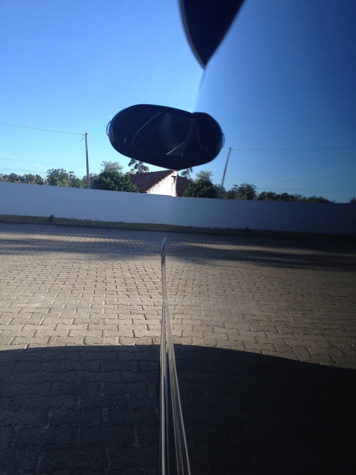 Dramatic mirror-like reflections on ceramic coated vehicle surface