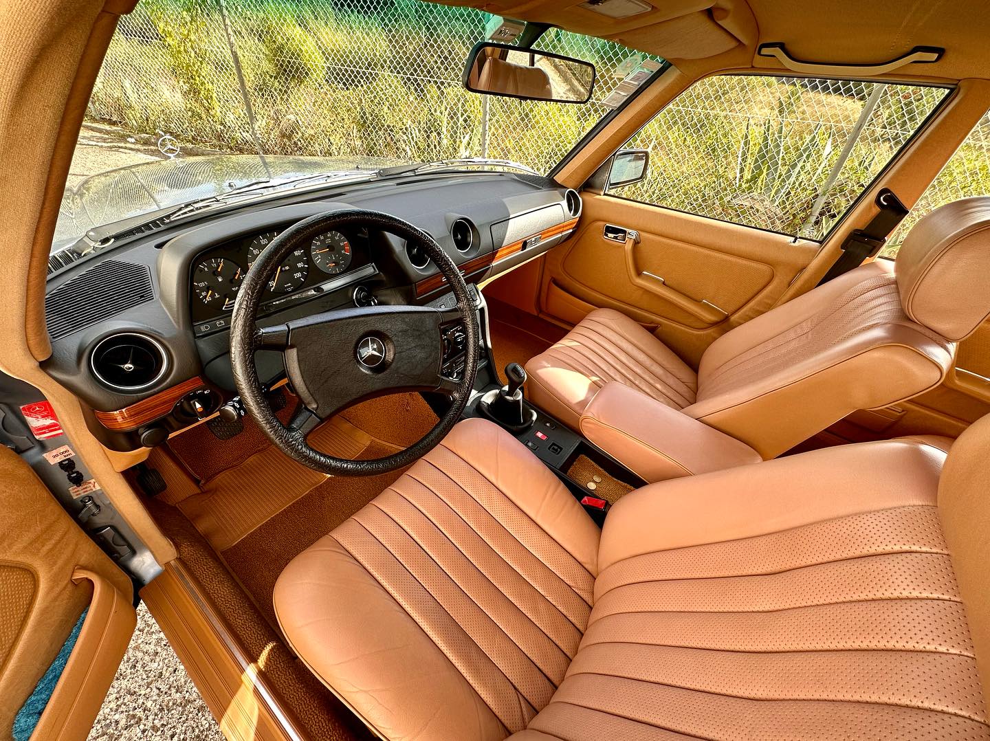 Classic Mercedes W123 interior with tan cognac leather after full cleaning and conditioning